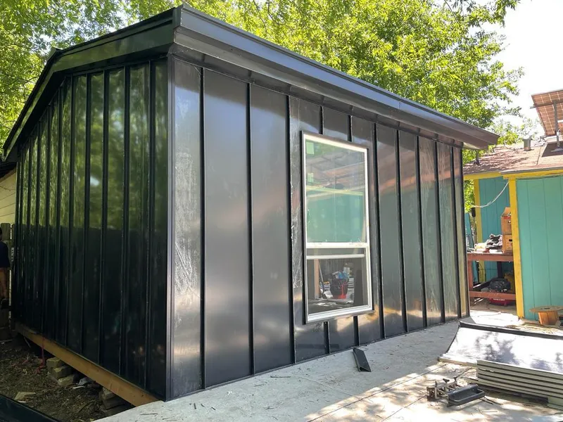 Black standing seam metal wall panels for Roof Inspection in Palm Beach